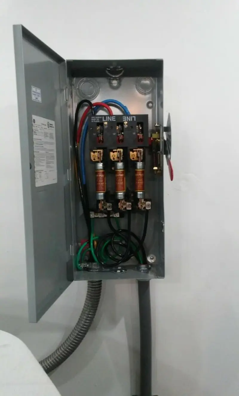 Three-phase disconnect switch installed for Smoke Detector Installation in Englewood